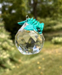 Baby dragon  fidget toy on a crystal ball suncatcher recycled crystal chandelier prism